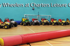 Row of mini electric Jeeps at Charters Leisure Centre Sunningdale