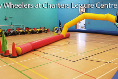 Yellow racing arch and mini electric Jeeps at Charters Leisure Centre