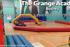 bouncy-castle-party-with-jeeps-Grange-Academy-Bushey-Herts