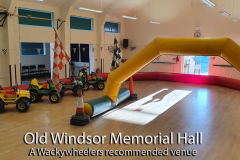 Electric mini Jeeps and racing arch inside Old Windsor Memorial Hall